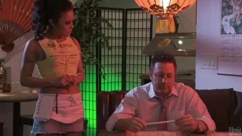 Two waitresses and a guest