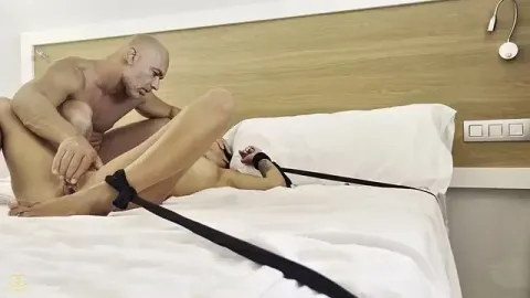 Tied and blindfolded, she yields to pleasure