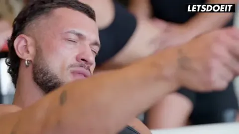 Athlete and partner share intimate moment at gym