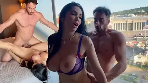 Woman Moans by Hotel Window as City Watches