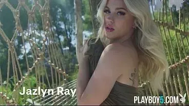 Curvy blonde model poses outdoors in natural light