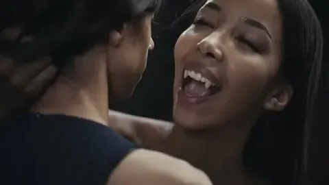 Lesbian Vampire Mesmerizes Partner in Intimate Encounter