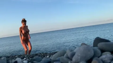 Swims Naked in Sea