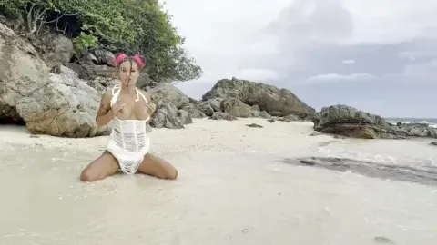 Swims in Sea and Fucks Pussy with a Big Dildo on a White Sand Beach