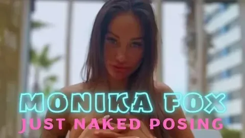 Nude Posing by Tattooed Model